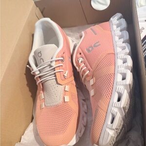 On Running Peach and White Sneakers